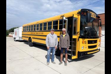 Cory Schmuck (left) and Jim Ouverson stand outside one of three Luverne Public School buses used for extra-curricular activities. Schmuck, the district’s building and grounds director, will also oversee the district’s transportation program with Ouverson hired as the transportation coordinator. The District has 13 regular bus routes. Mavis Fodness/Rock County Star Herald Photo