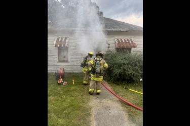 Luverne firefighters practice emergency response methods Monday, Sept. 1, during a controlled burn of a house at 716 N. Spring Street. A new house will be built on the city-owned lot by Luverne High School students through the Today and Tomorrow’s Tradesmen (TnT) class.