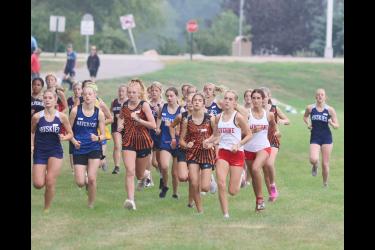 Luverne senior Jenna Debates and freshman Khloe Visker take off in the girls’ varsity 5,000 meter event Saturday, Sept. 9 in Luverne. DeBates finished the race in first place with a time of 18:33.70 and Visker finished in 10th place with a time of 21:39.75.
