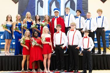 The Homecoming Royalty Court members pose for an official picture Monday night at the Hills-Beaver Creek Secondary School. Pictured are (front, from left) Iversyn Scott, Norah Top, Brynn Bakken, Hunter Leenderts, Keaton Huisman, Kameron Kellenberger, (back) Abby Olson, Abigail Harris, Ella Sammons, Mya Erickson, queen Claire Knobloch, king Micah Bush, Jamin Metzger, Eduardo Wegener, Gavyn Leuthold and Jacob Wallin. Samantha McGaffee/Rock County Star Herald Photo