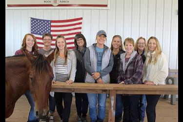 Rock Ranch, located west of Hills, recently joined 15 other therapeutic riding facilities in Arenas for Change and formed a local equine-assisted therapy team of (from left) barn manager Jessica Richters, office manager Staci Bundesen, Natasha Kellenberger, Lynne Hunter, Marie LaRock, Carissa Palmberg, Dolores Bundesen, Patti Swenson and Jill Jonnes-Kuca. Mavis Fodness/Rock County Star Herald Photo