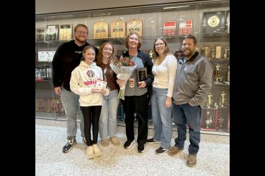 Luverne Elementary School teacher Laura Louwagie was named the 2026 Teacher of the Year during an American Education Week event Monday afternoon in the Luverne Middle School-High School Commons. Her family members were on hand to celebrate her recognition. Pictured are (from left) Jonah, Hadley, Reese, Laura, Nora and Chris Louwagie. Lori Sorenson/Rock County Star Herald Photo