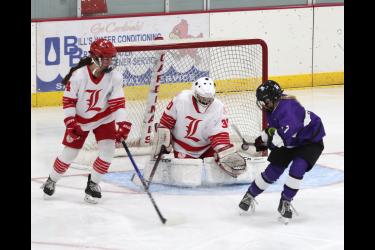 LHS goaltender, sophomore Emma Saarloos, stops a New Ulm shot Tuesday, Nov. 14, in Luverne. Saarloos stopped 25 of 27 shots from the Eagles in the Cardinals’ 0-2 loss. The Cardinals beat Windom 10-1 Nov. 16 on the road.