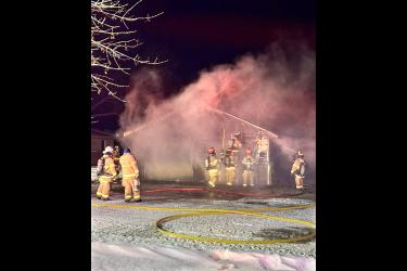 Members of the Luverne Fire Department work to control a blaze at 1002 U.S. Highway 75 on Saturday night, Dec. 13. The structure was a total loss. Shared Image