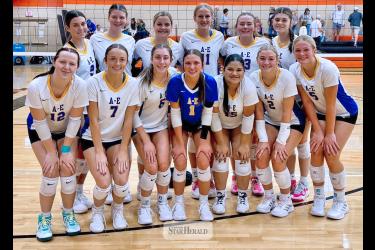 The Dragons  volleyball team  poses for a photo at the Jimmy John’s Tournament in Marshall Oct. 10  after placing  second in the event.   Players are (front left to right) Kaci Palmer, Kadelyn Cummings, Jordan Kruger, Kaedyn Bullerman, Francell Lopez Rodriguez, Ava Brown, Kamry Lehnhoff (back) Jacy Diekmann, Lily Rodrigue, Audrina Tiesler, Charlee Lehnhoff, Taylor Luing and Ashton Van Ede. (Shared image)