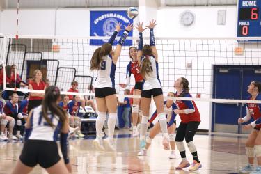 Greg Hoogeveen photo/HBCVB1 H-BC senior Olivia Deelstra sends a rocket past two Garretson players Oct. 15 on the road. The Patriots won the match 3-0. 