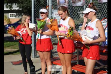 Greg Hoogeveen photo/1008LHStennis1 LHS tennis team celebrates senior night Oct. 1 in Luverne. Seniors Marlee Nelson-manager, left, Allyssa Evers, Olivia Ver Steeg and Sophia Remme receive flowers before the match with Marshall. LHS fell 6-1 to the Tigers.