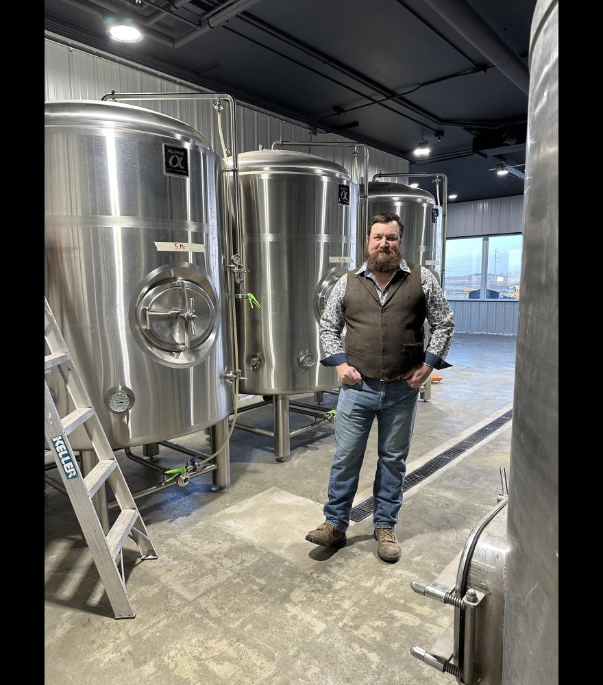 The 1,500-square-foot cider production room replaces the relocated bridal room. The room is encased in oversized glass windows and doors to show off the apple-pressing process to curious onlookers in the adjacent tasting room.